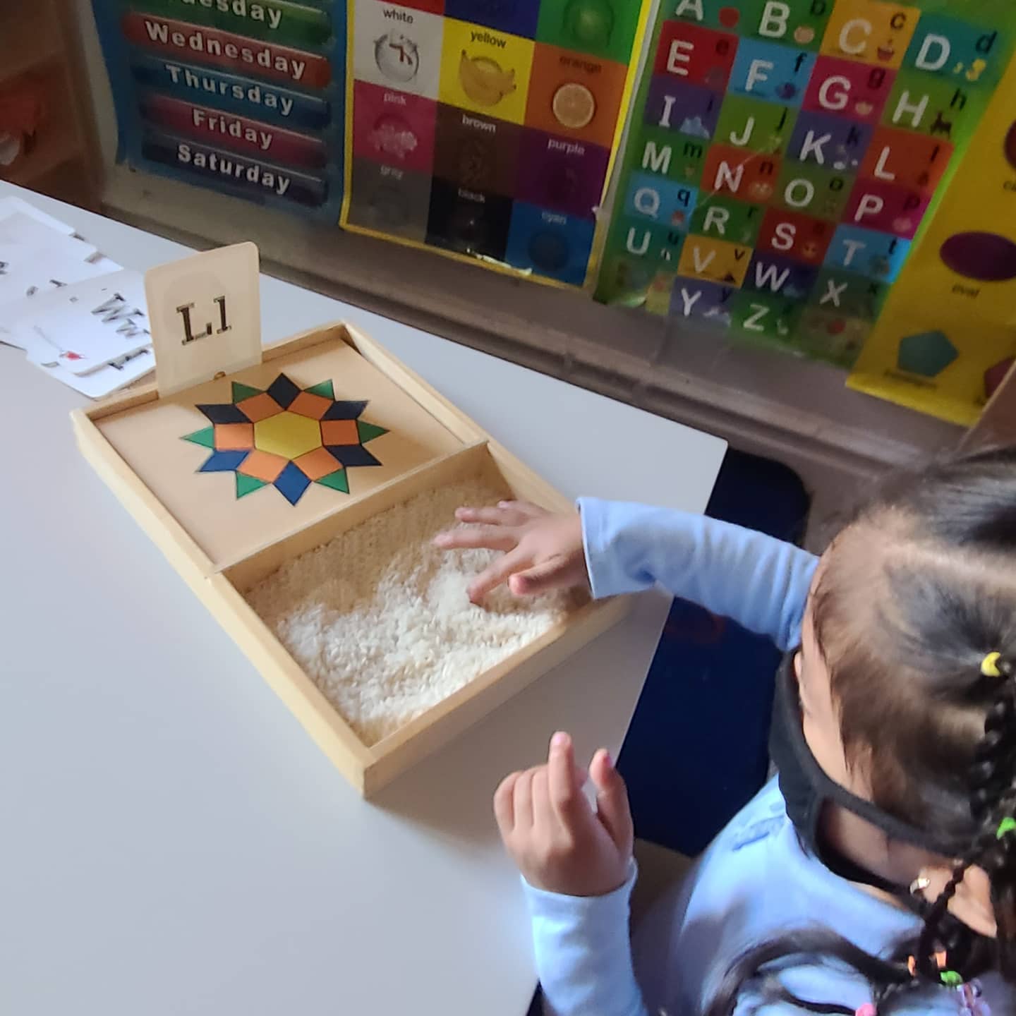 Letters rice tracing... - Happy Faces Early Learn childcare