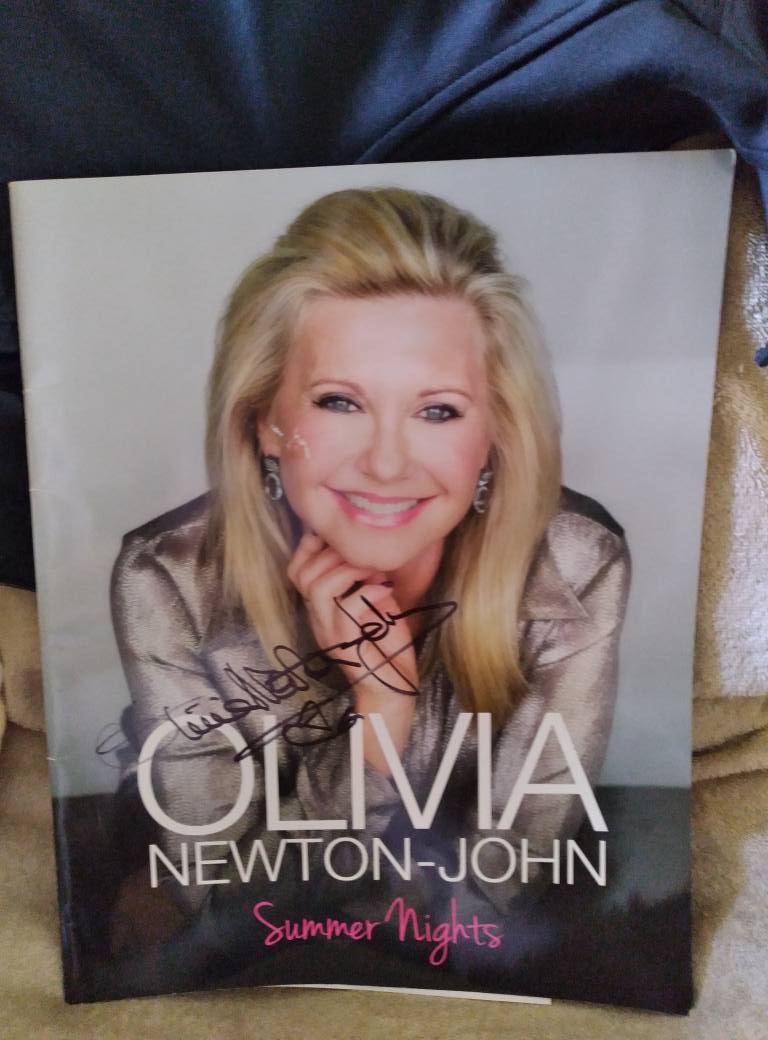 Olivia Newton-John signs fan's physical album