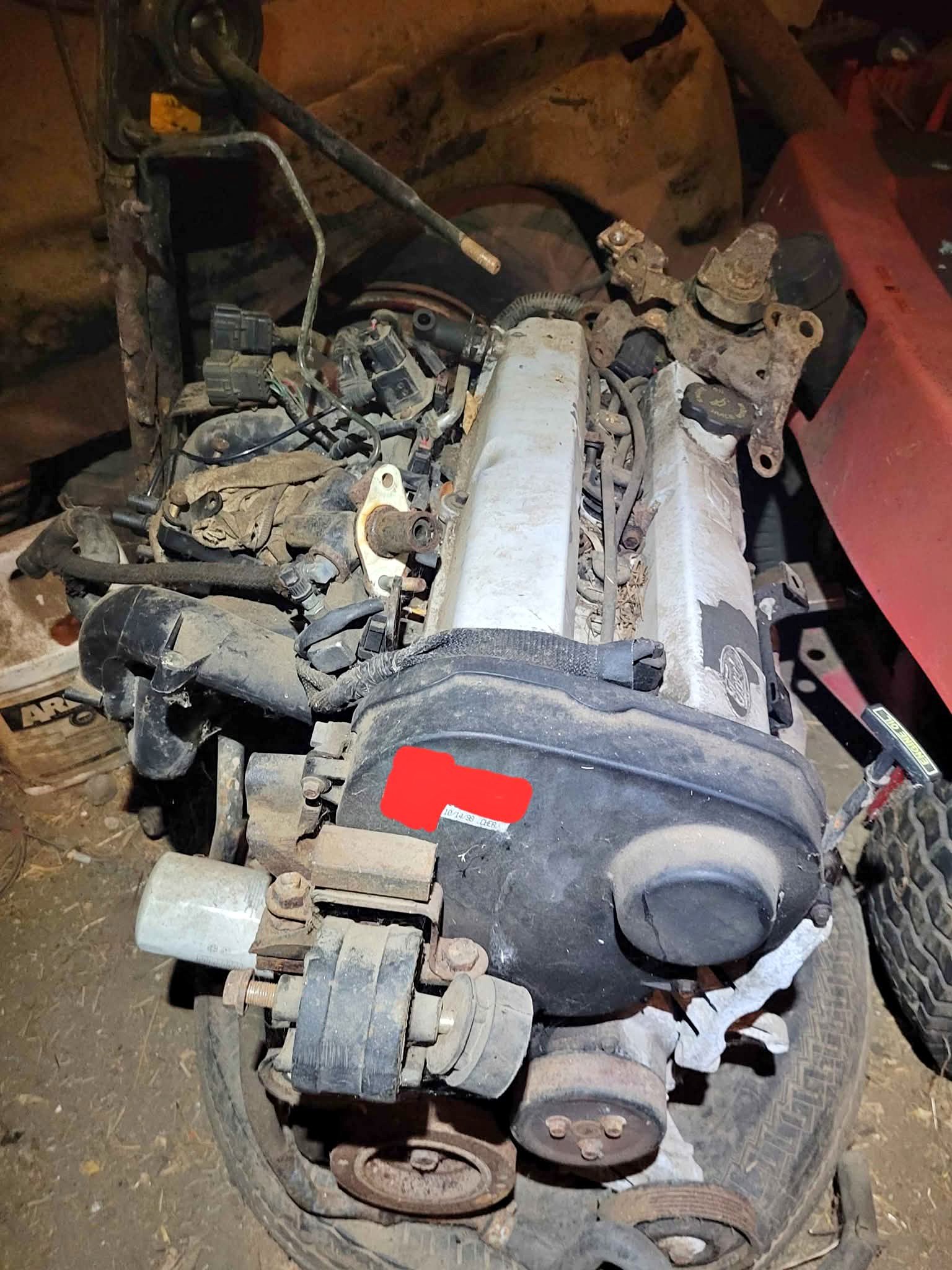 Motor and connected 5speed manual transmission from a 1999 Ford Escort ...