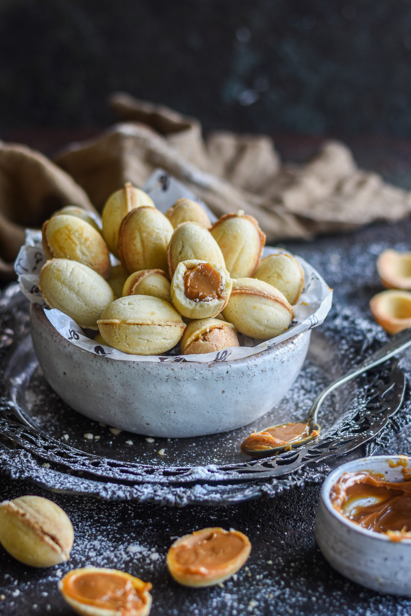 Oreshki or Walnut Cookies are crumbly on the outside and filled with a creamy center. Recipe: https://momsdish.com/recipe/102/russian-walnut-cookies