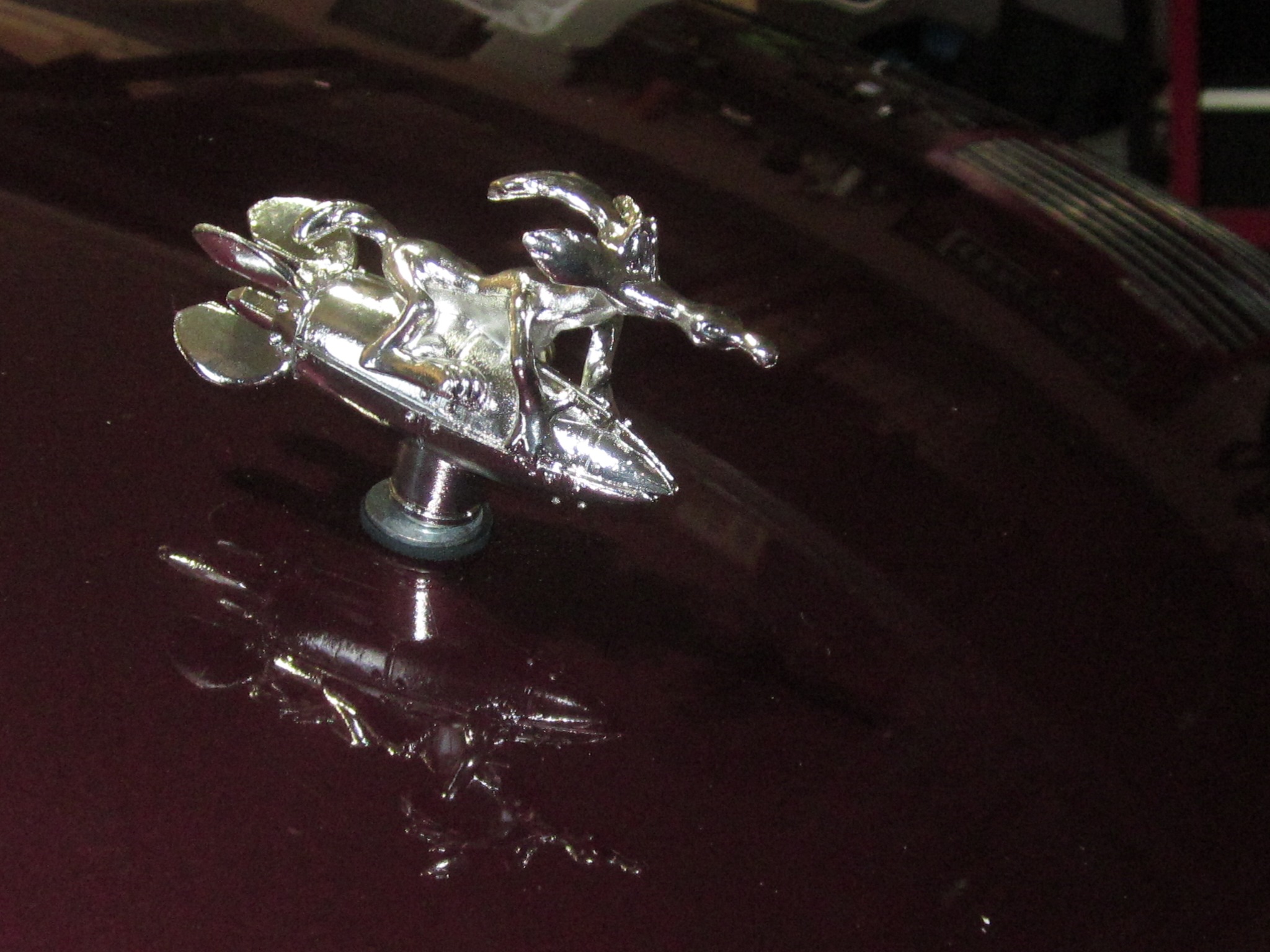Wylie Coyote hood ornament on PT Cruiser
