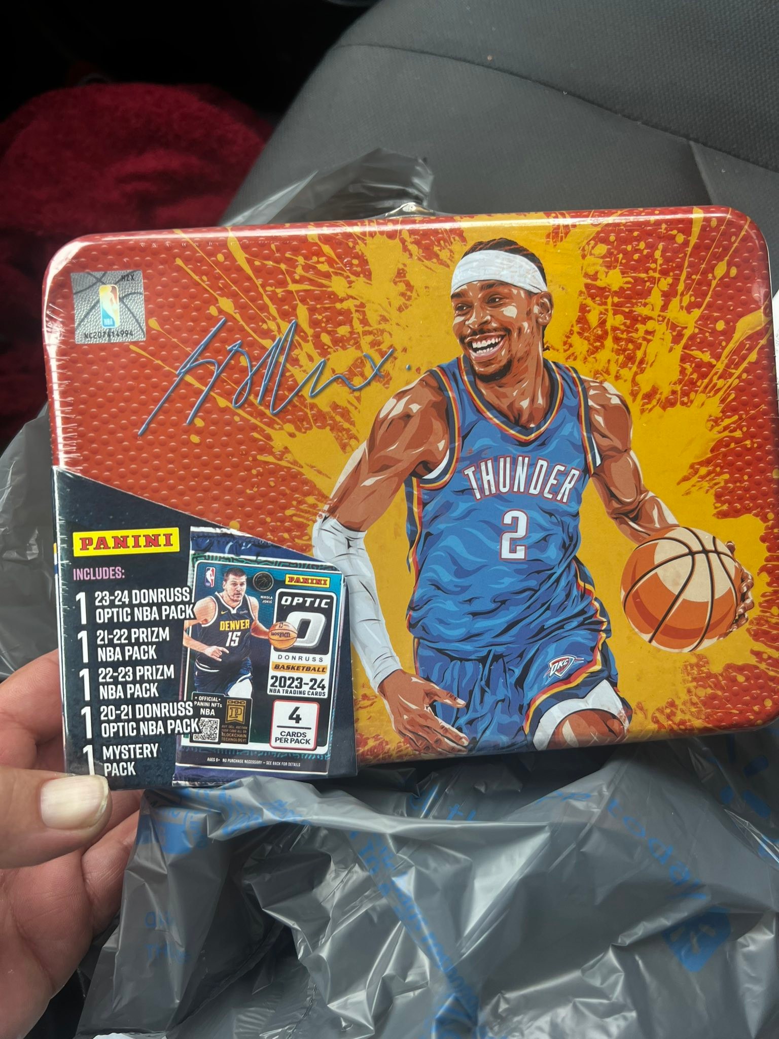 Sealed sports card product with court pieces and MVP