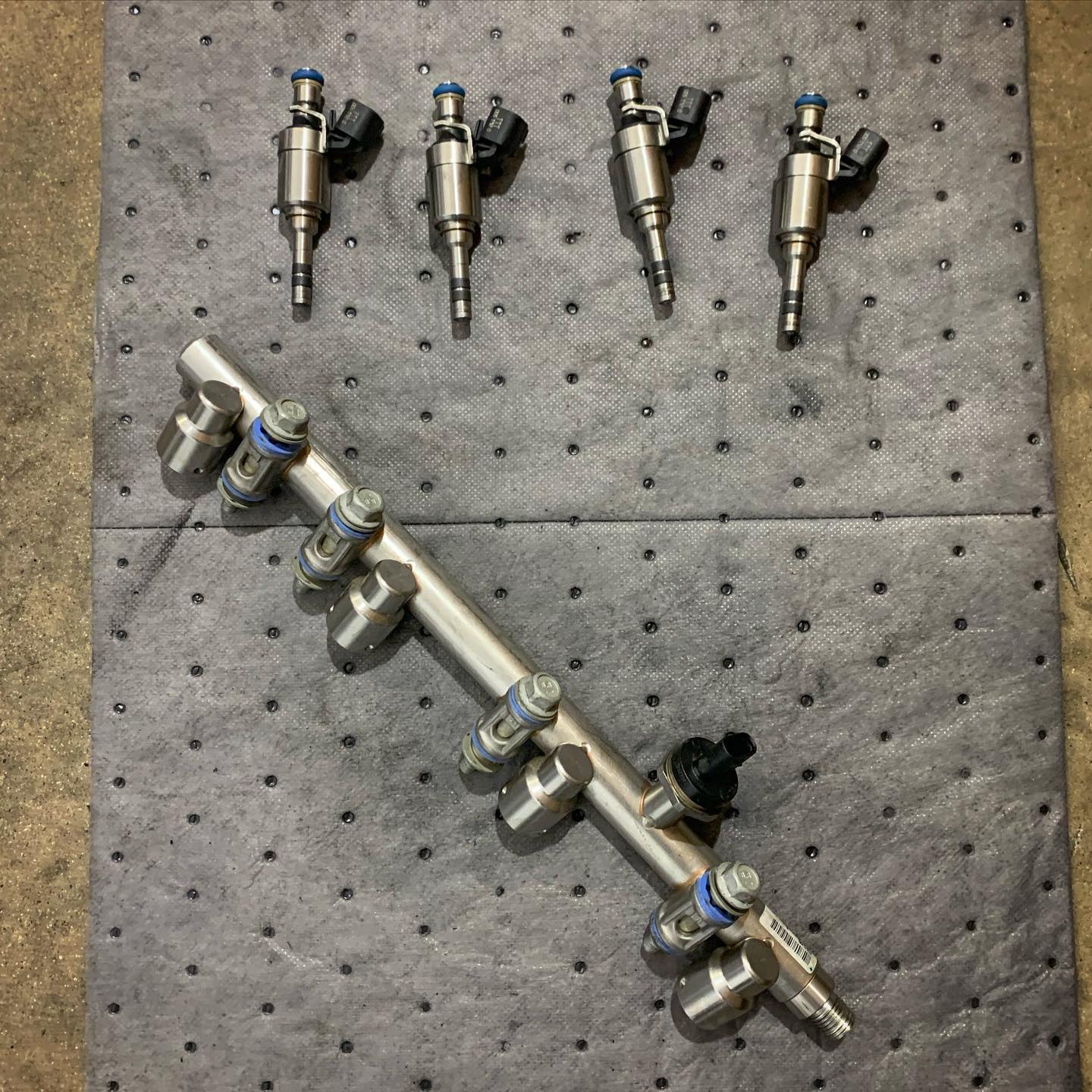 Seven - Fuel rail and injectors cleaned and tested. Everything has been ...