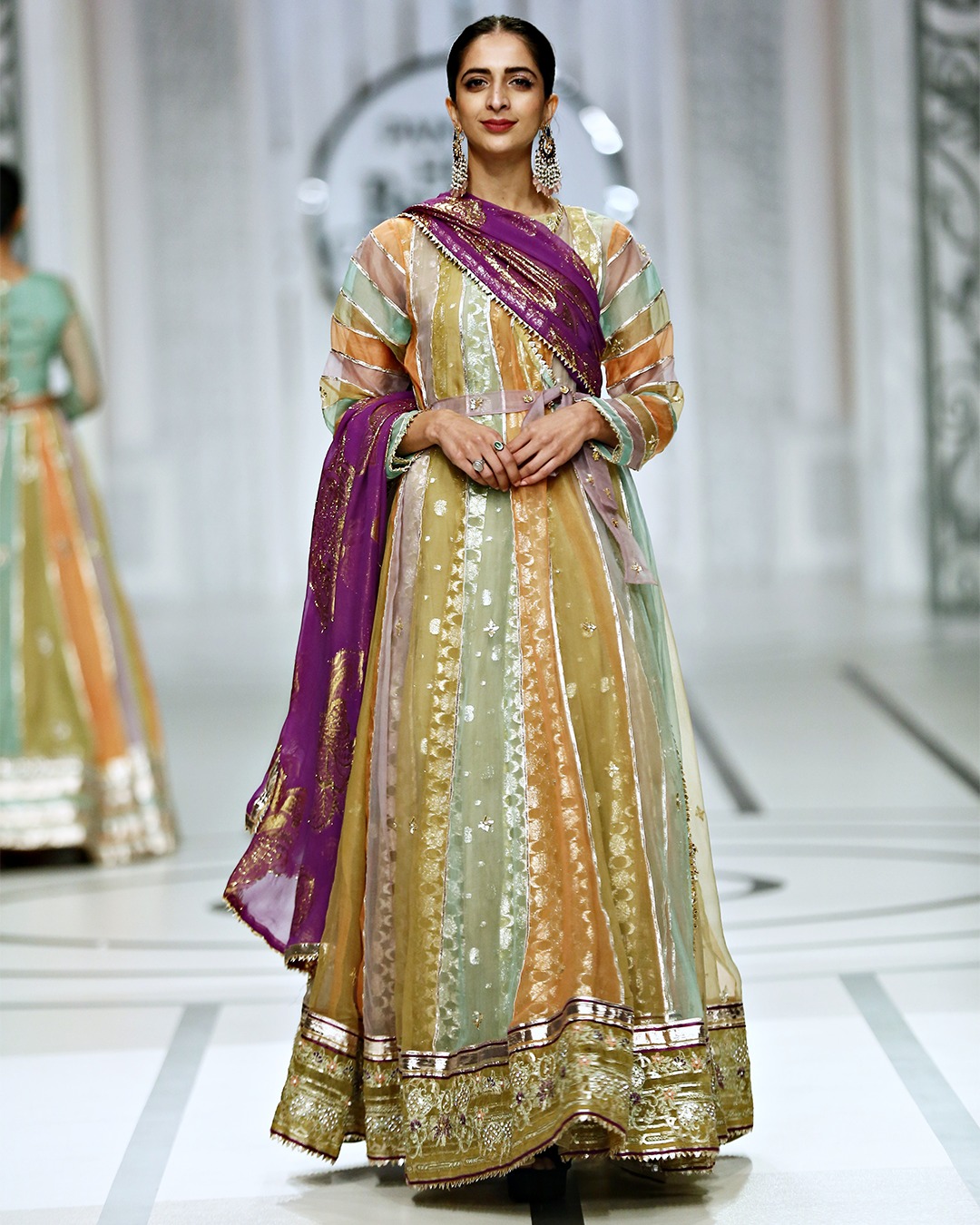 A multi coloured paneled embellished... - FAS Design Studio