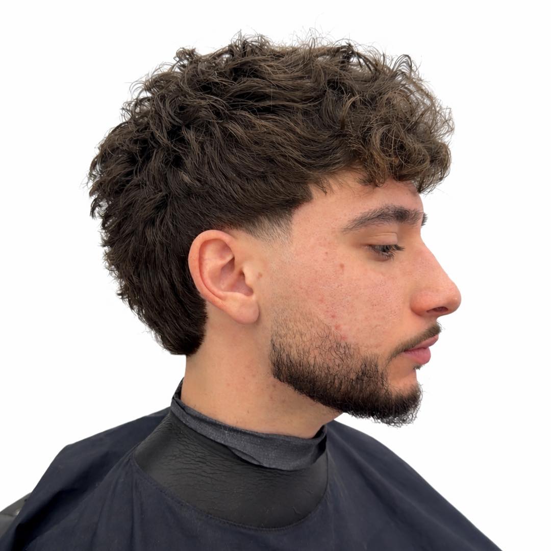 Show this haircut to your barber Modern mullet with taper and rounded ...