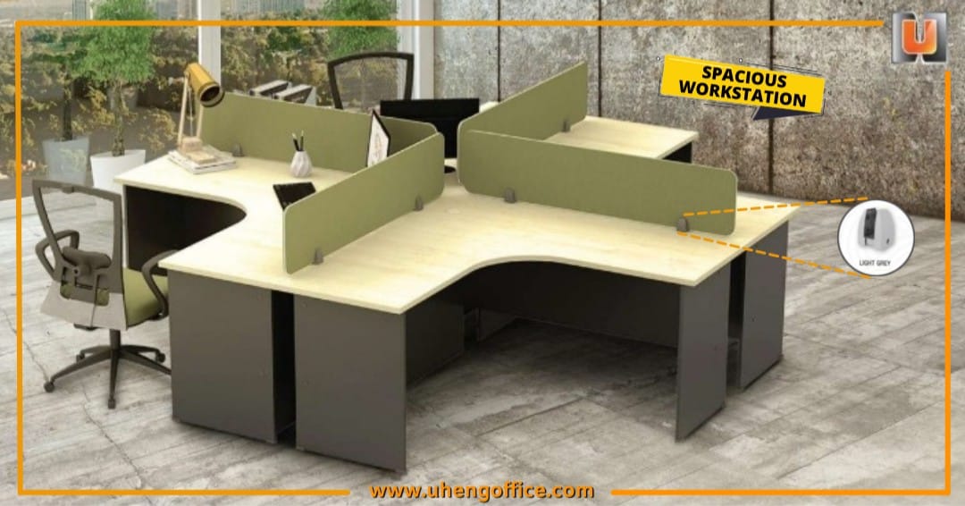 A combination of L-shaped tables makes a 4-seater workstation. With the ...