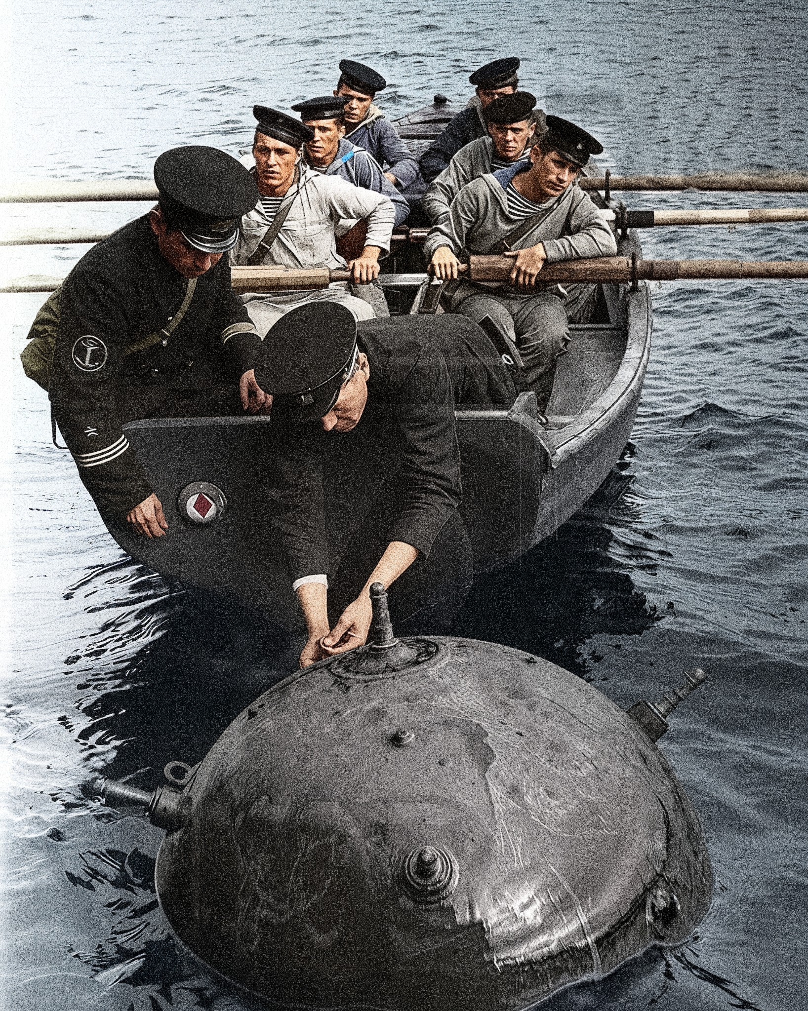 CH Inam - Soviet sailors taking care of a marine mine on a boat ...