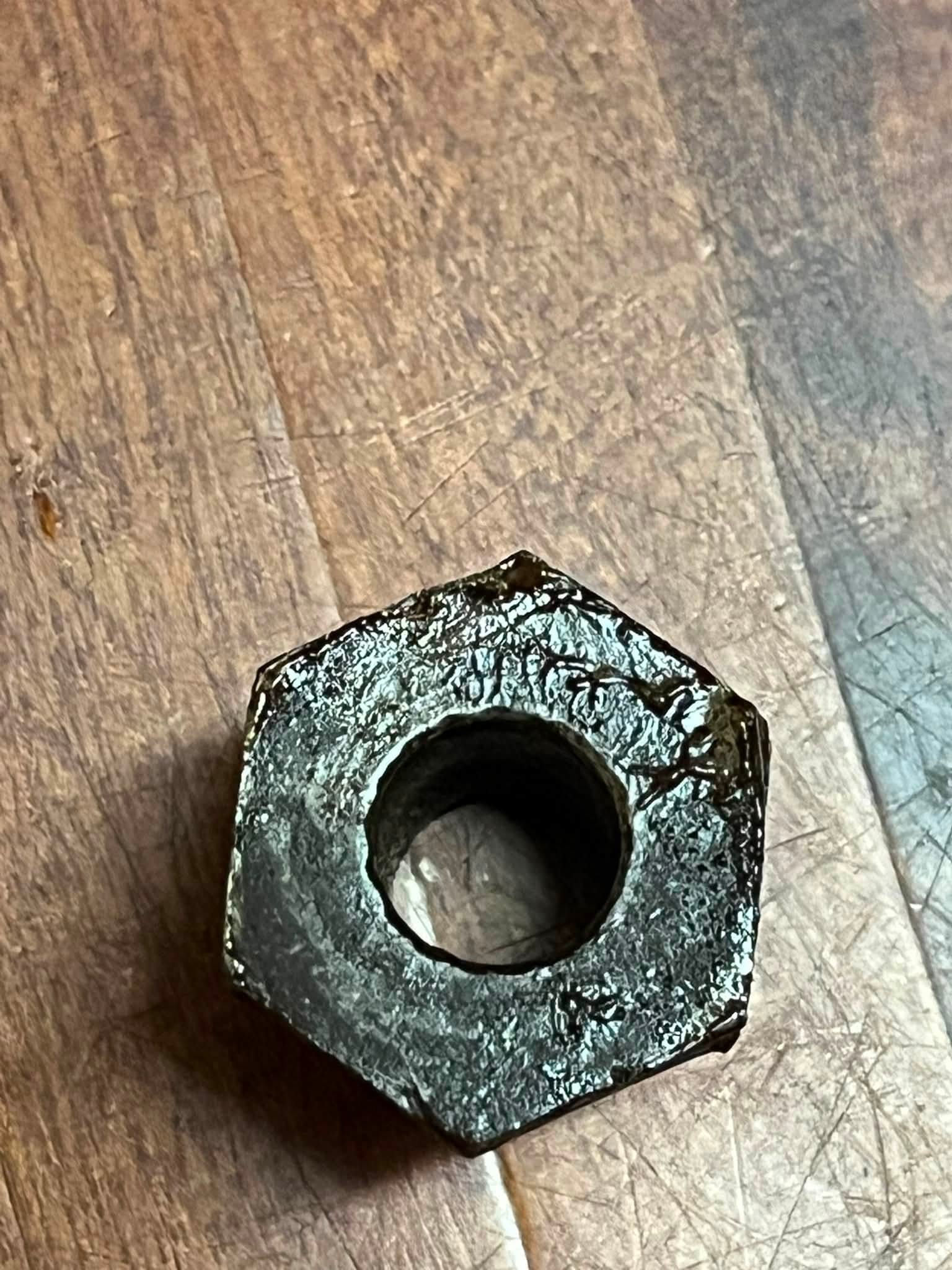 Identifying motorcycle parts for 1/4 inch CEI nuts and 15.82mm