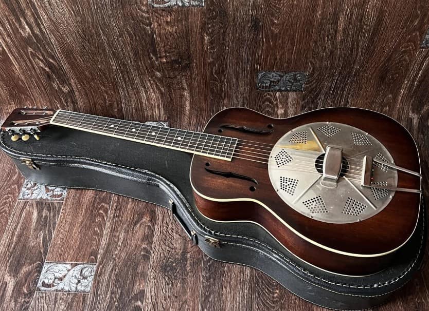 This is an amazing playing vintage National Guitar. It has been