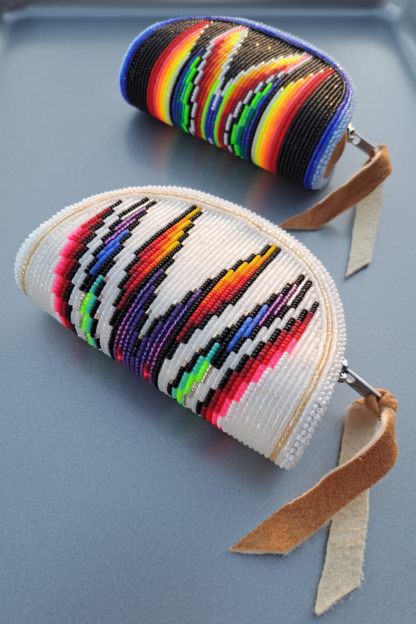 Shoshone-Bannock tribal member's handmade beaded coin purses