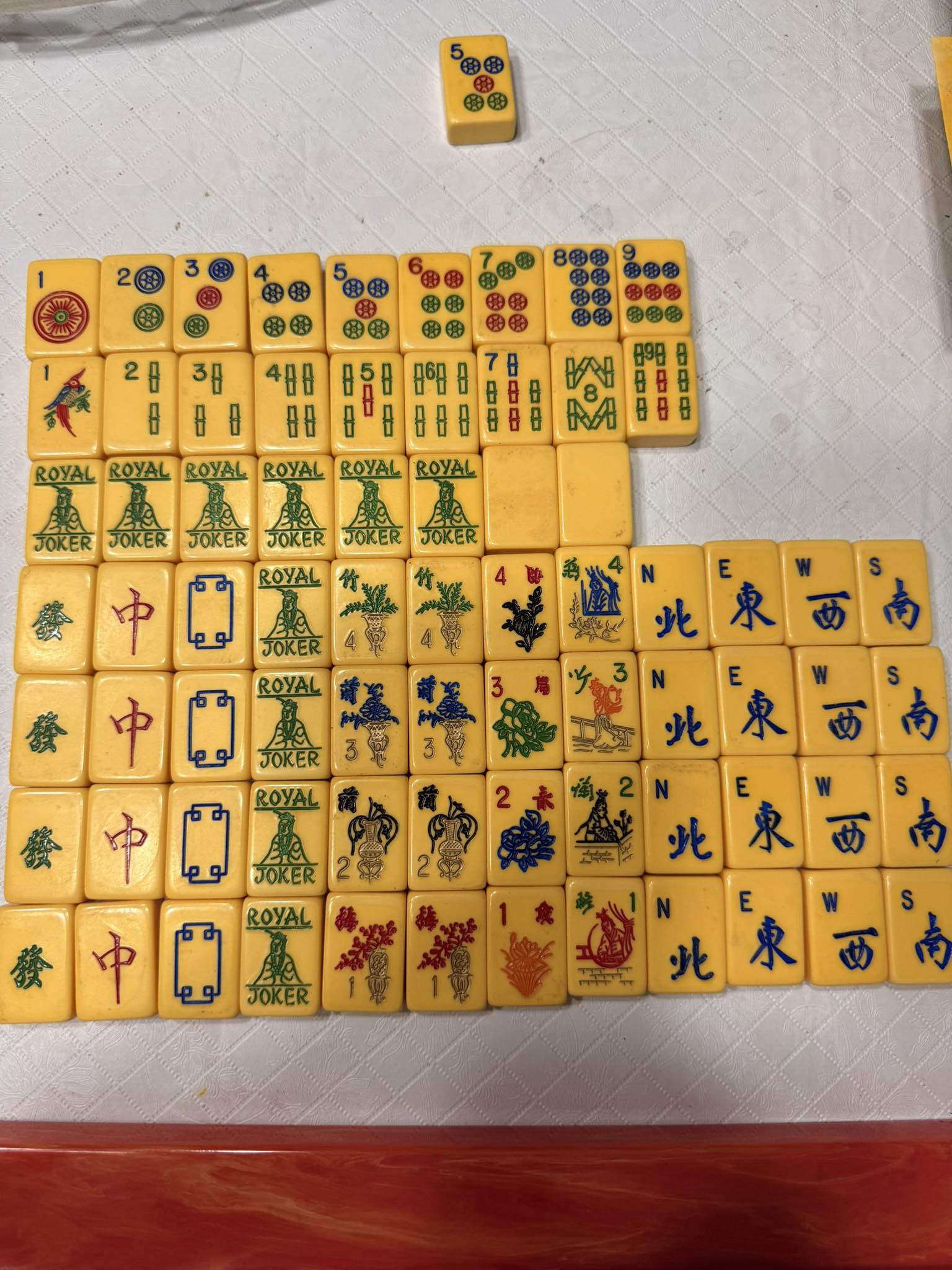 Identify antique tiles and flowers?