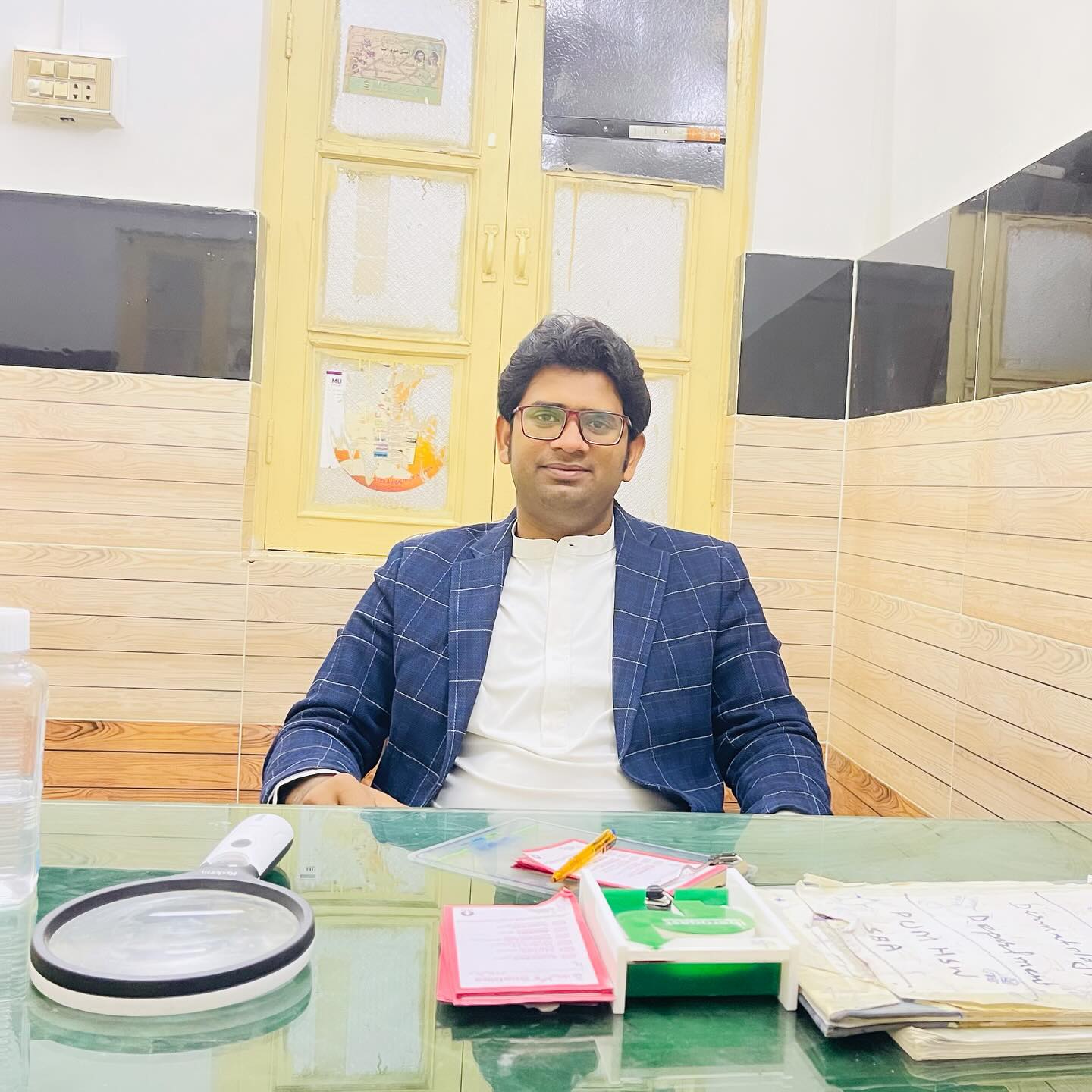 Dr Asad