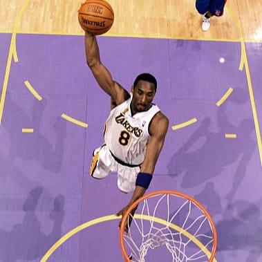 Kobe Bryant #8 of the Los Angeles Lakers goes up for a reverse