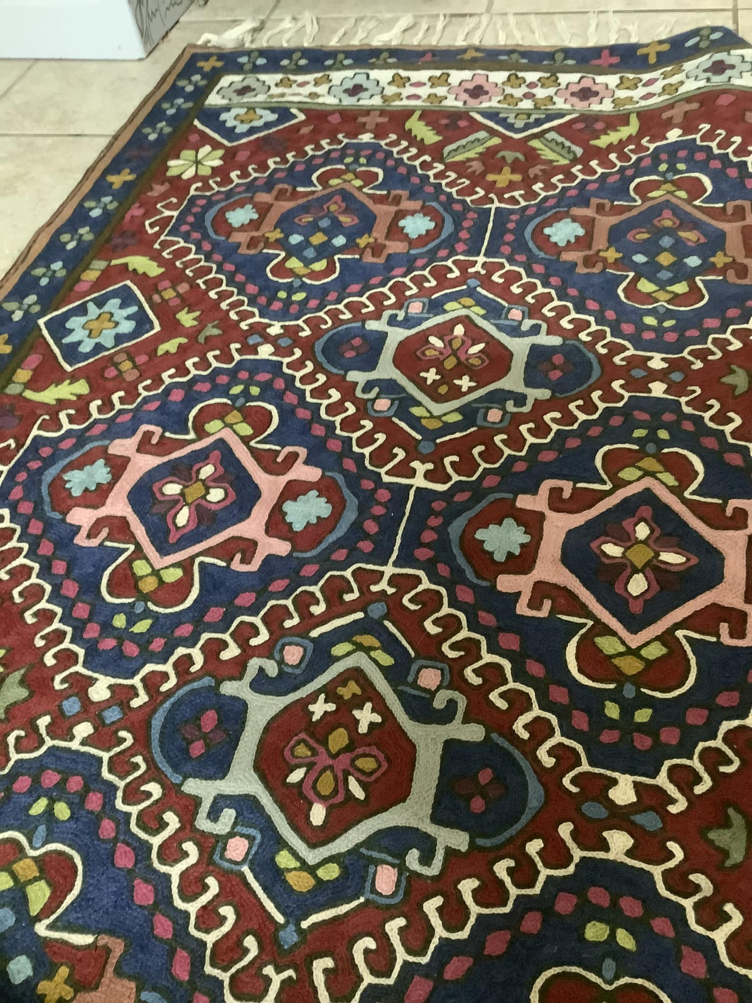 A vintage rug/tapestry by the artist “Tere” Teresa Gonzalez, found