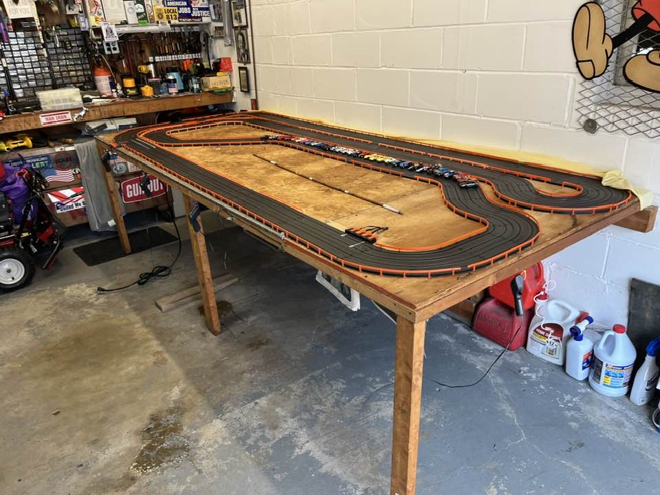 4 lane Tomy AFX flips up against the wall when done.
