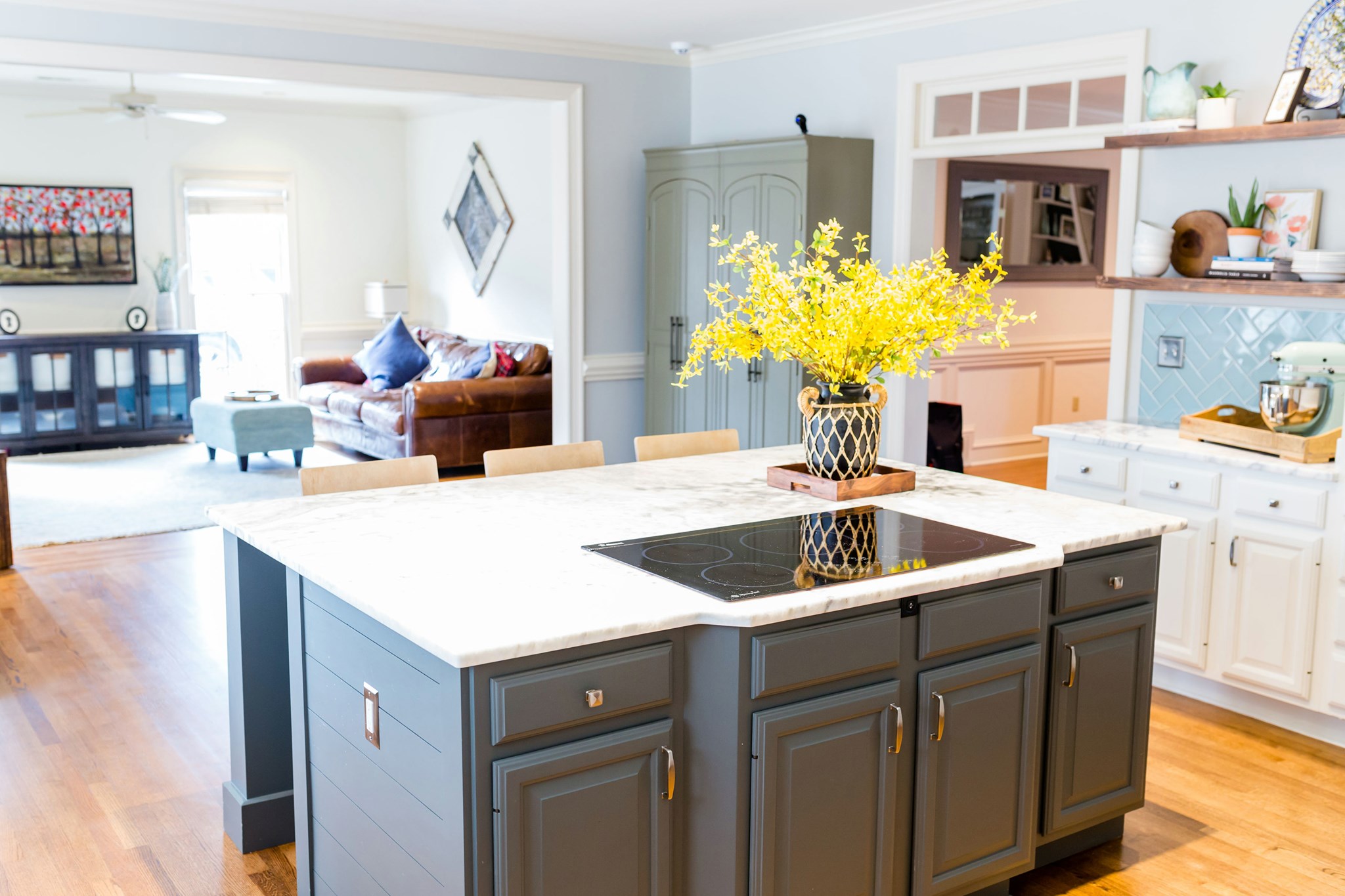 This client’s kitchen island is where much of life happens. It’s the ...