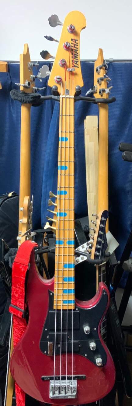 Yamaha Attitude basses customized with Monkey Grip and swirl paint