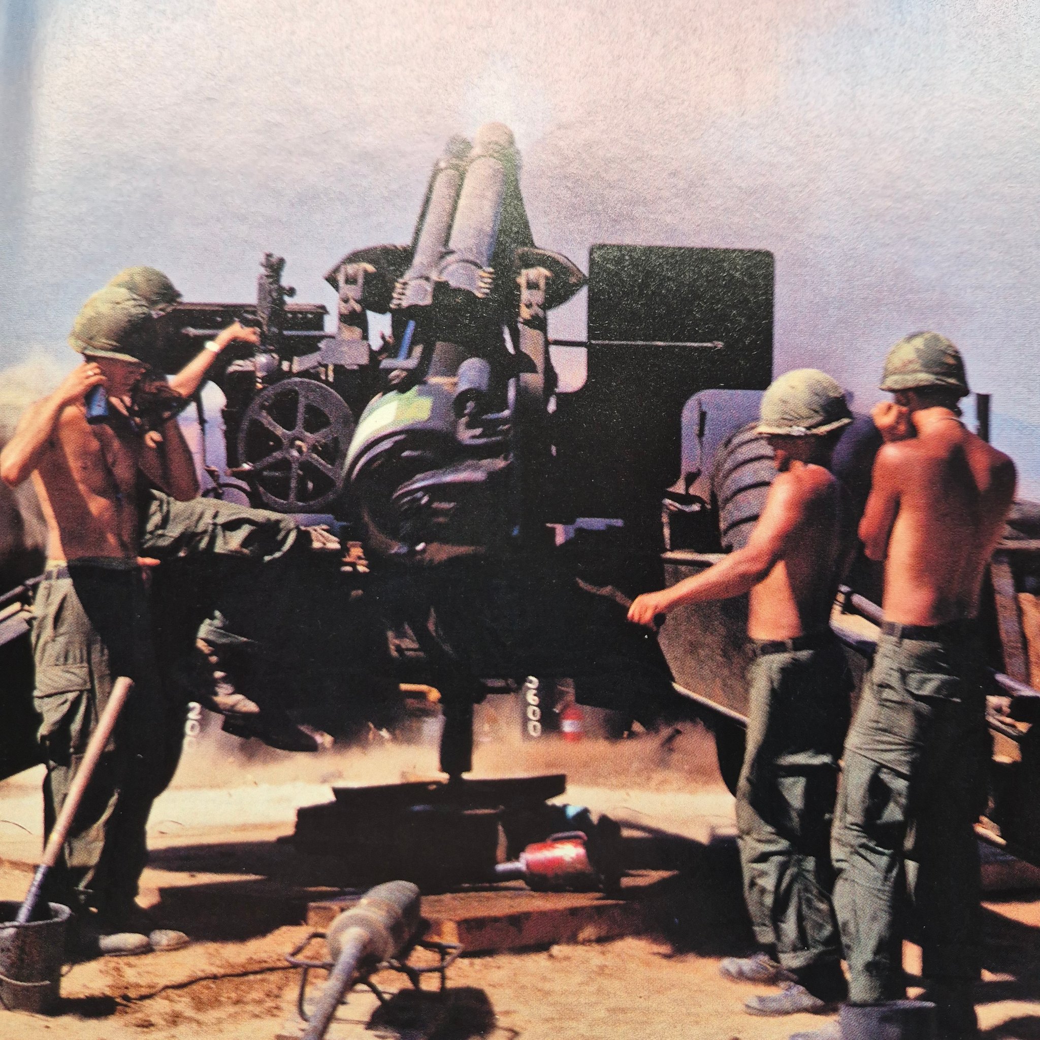LZ Snoopy artillerymen fire 155 Howitzer.