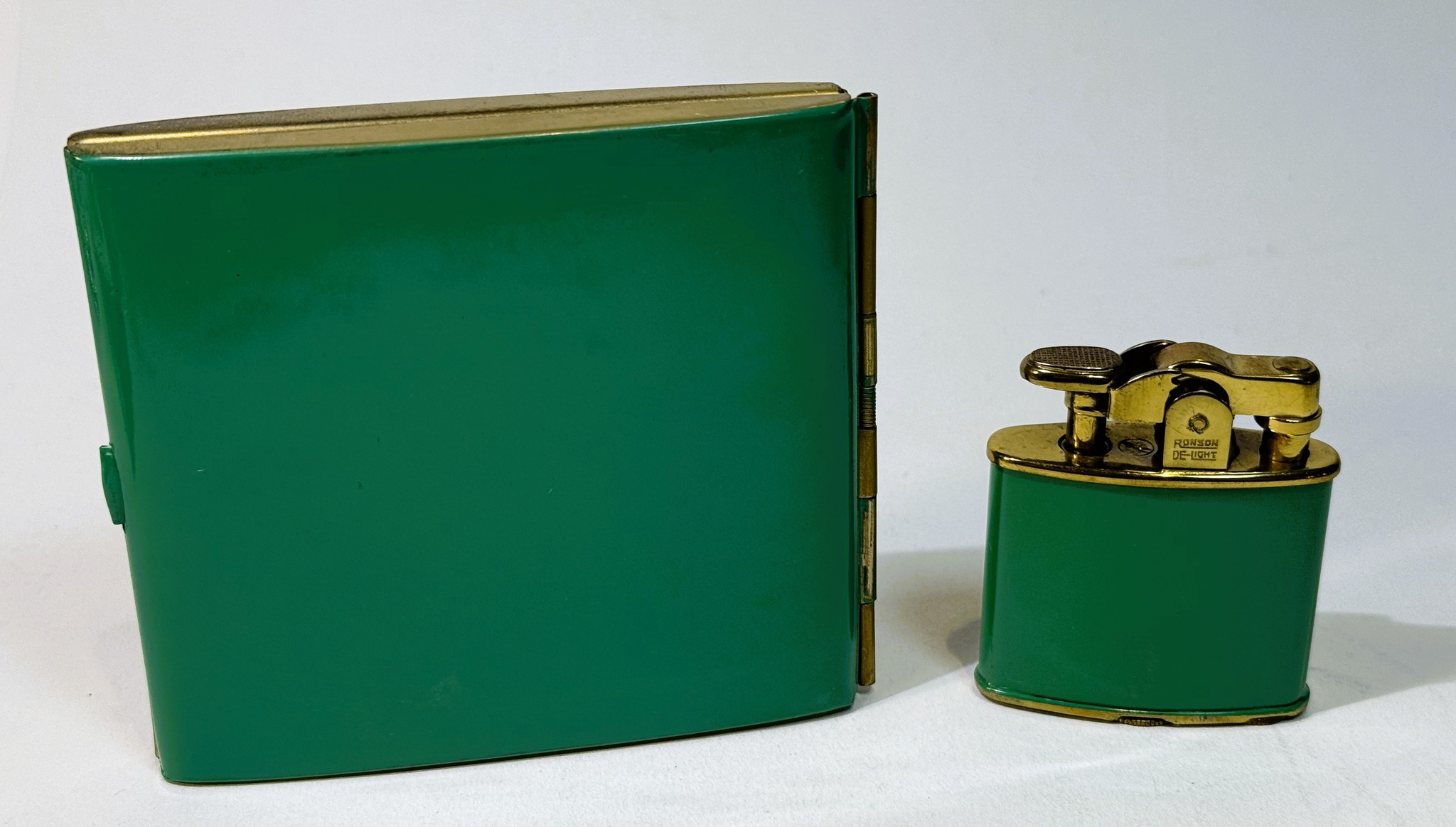1927 Ronson art deco enamel pocket petrol lighter with twin zig 