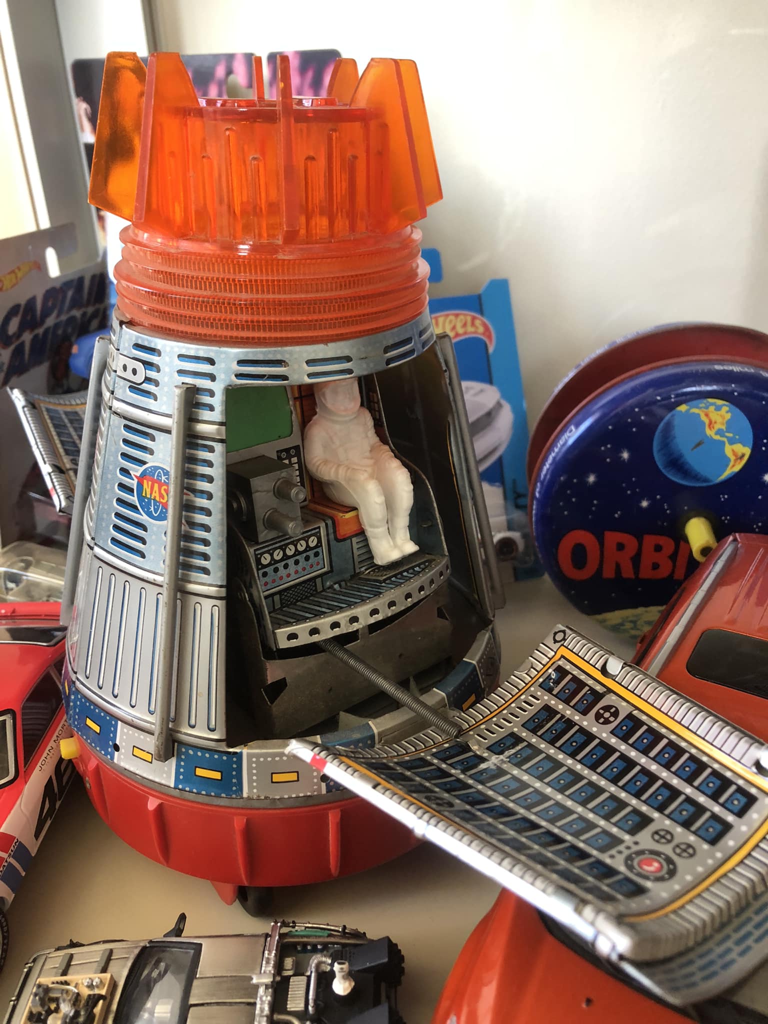 Vintage Japanese tin toy capsule in Retro Rockets collection