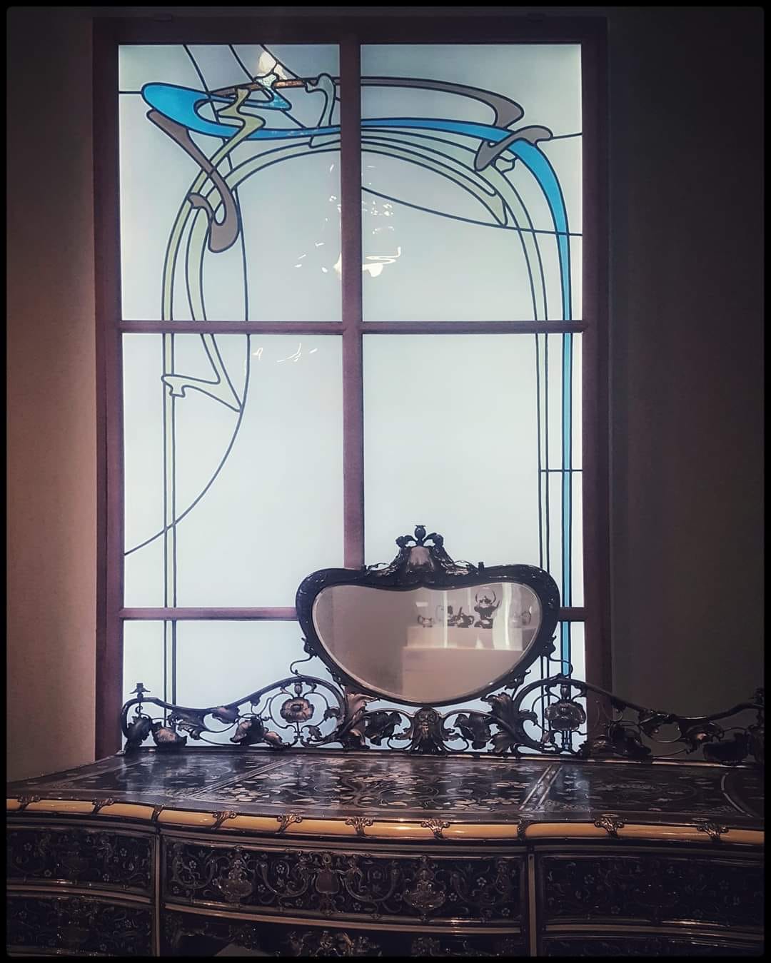Window by Hector Guimard . 1896 . Martele writing table / mirror