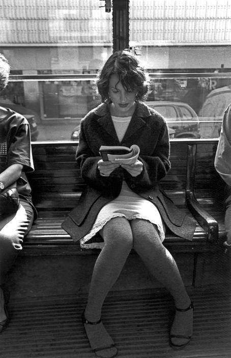 Ferdinando Scianna. Milano, Italy. Woman reading in the tramway, 1997.