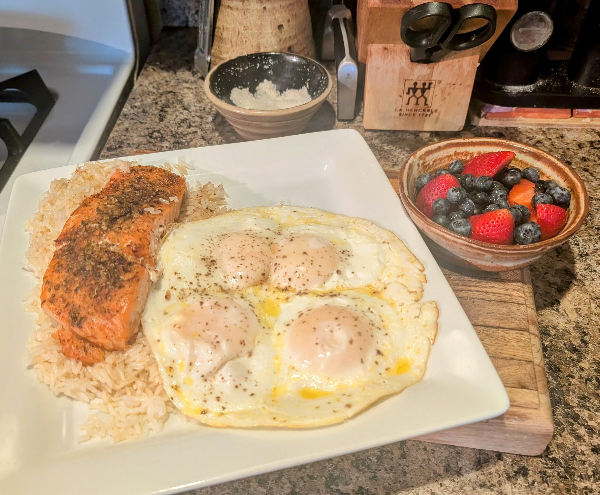 Kyle - Good morning! Faroe Salmon over rice with whole eggs, berries ...