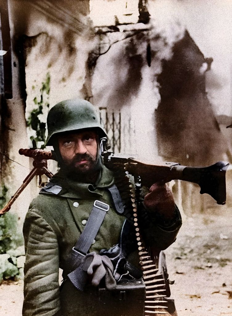 CH Inam - A historical photos of a WW2 A German machine gunner poses ...