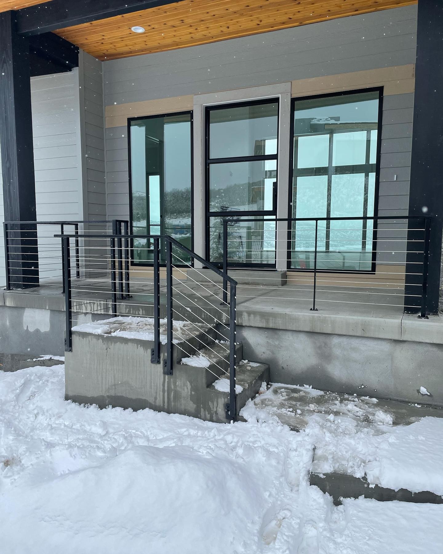 Cable railing on the front porch,... - Iconic Fabrication LLC | Facebook