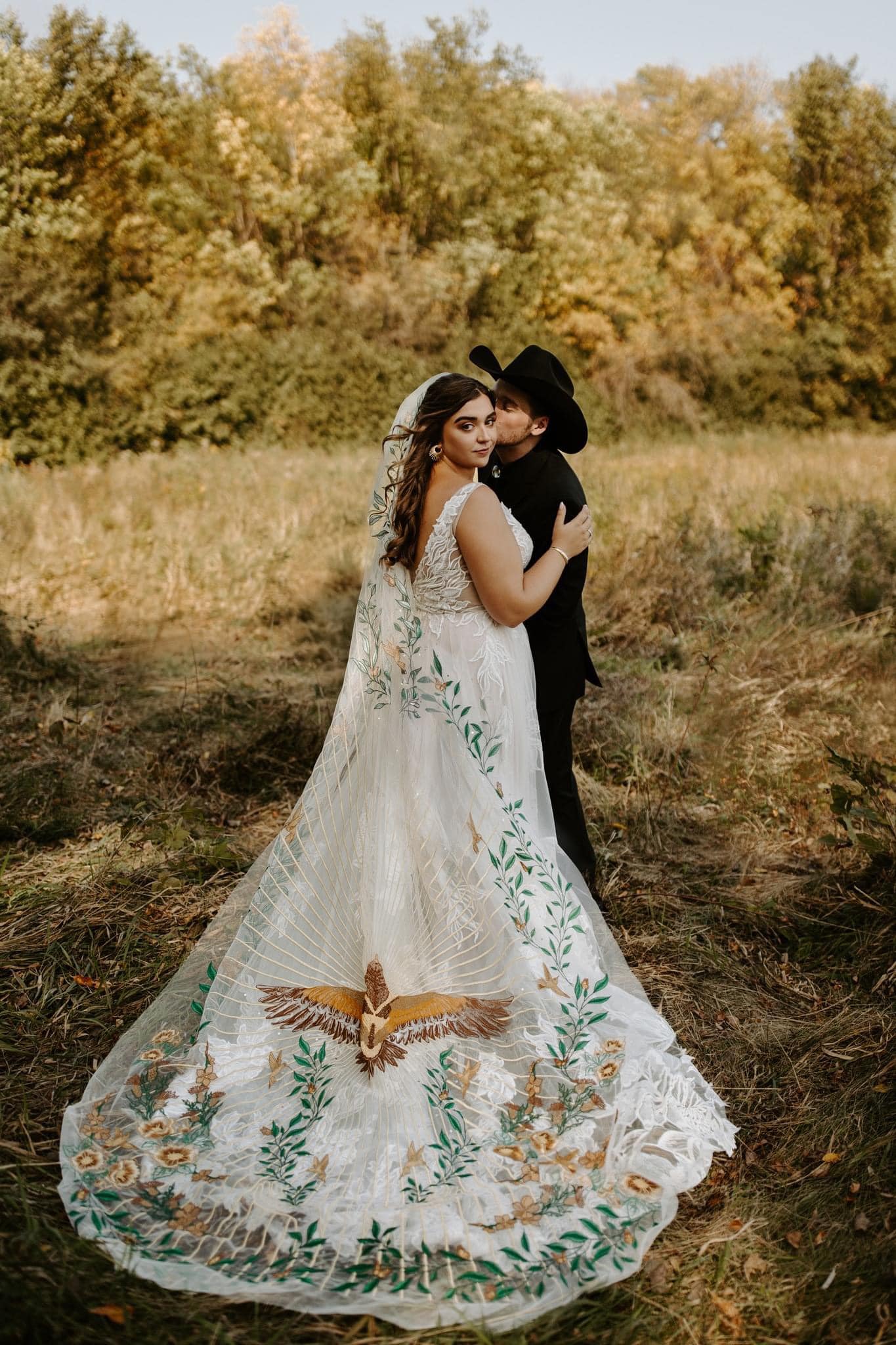boho wedding dress with veil First photo by Two Pines Photography Make a statement with Above $600 Sherri Hill Illusion Side Size:2Xl
