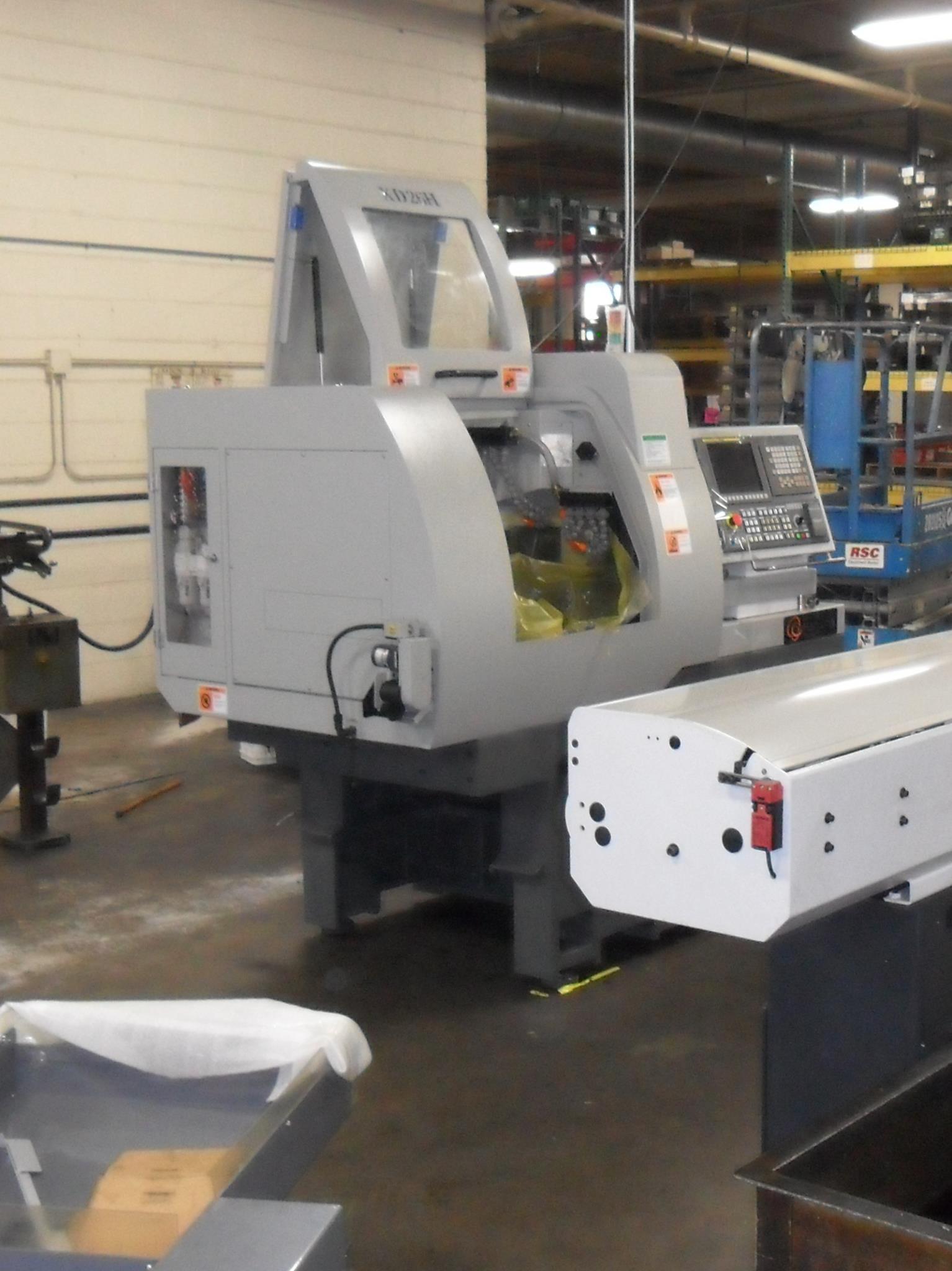 Cass Precision Machining - We just slid a second Hanwha Swiss into ...