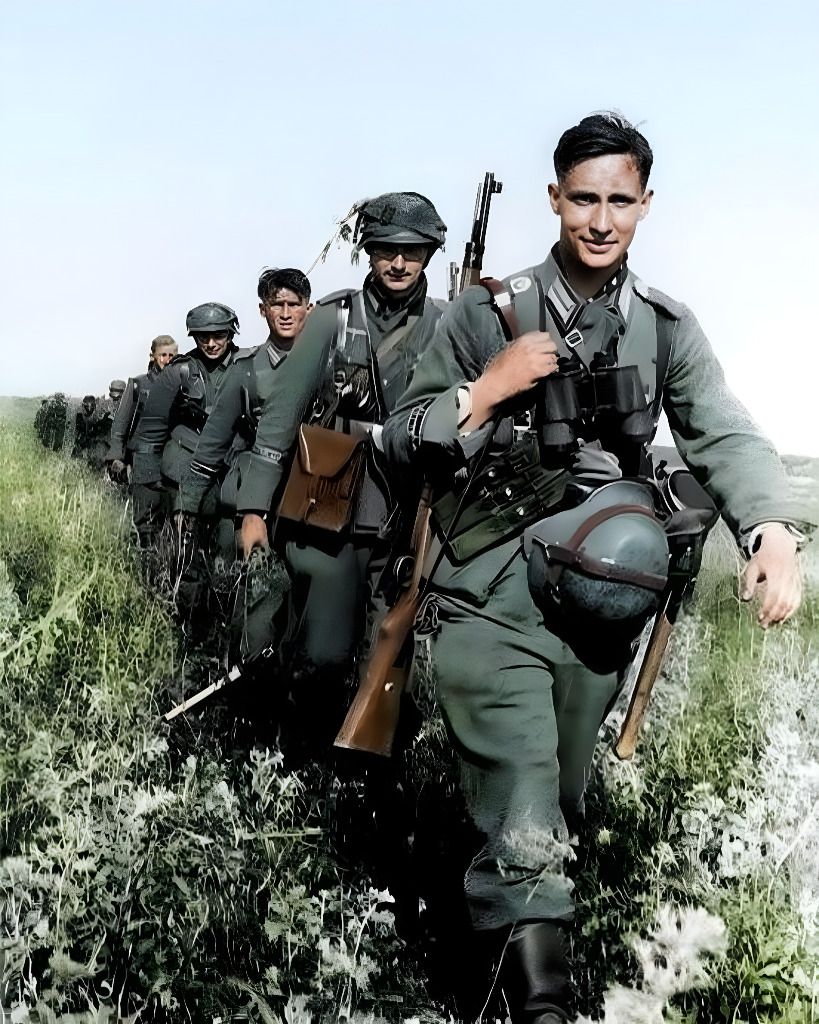 CH Inam - German soldiers of the Wehrmacht walking in a field during ...