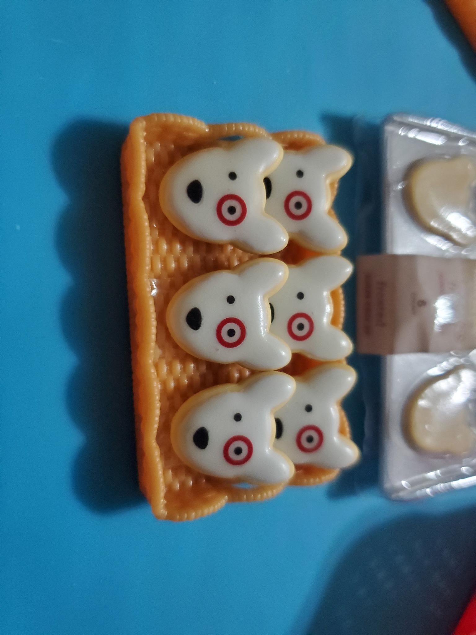 Customizing Miniverse bullseye cookies with gel polish and stickers