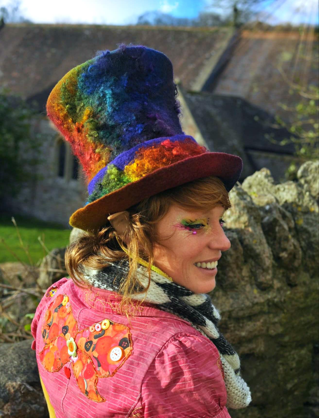 Handmade wool felt hat with pastel rainbow effect by Hojo Hattery