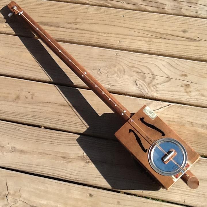 Witchdoctor's one string diddley bow guitar with preamp EQ pickup