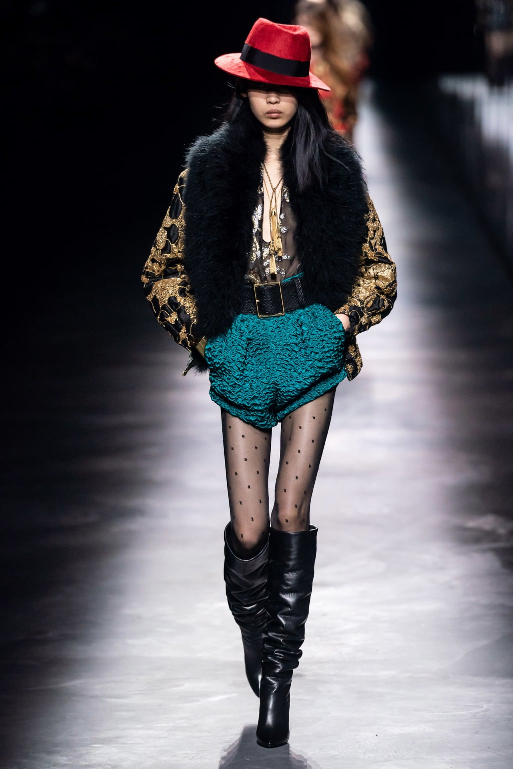 The former of Yves Saint Laurent produced a lavishly worked beaded