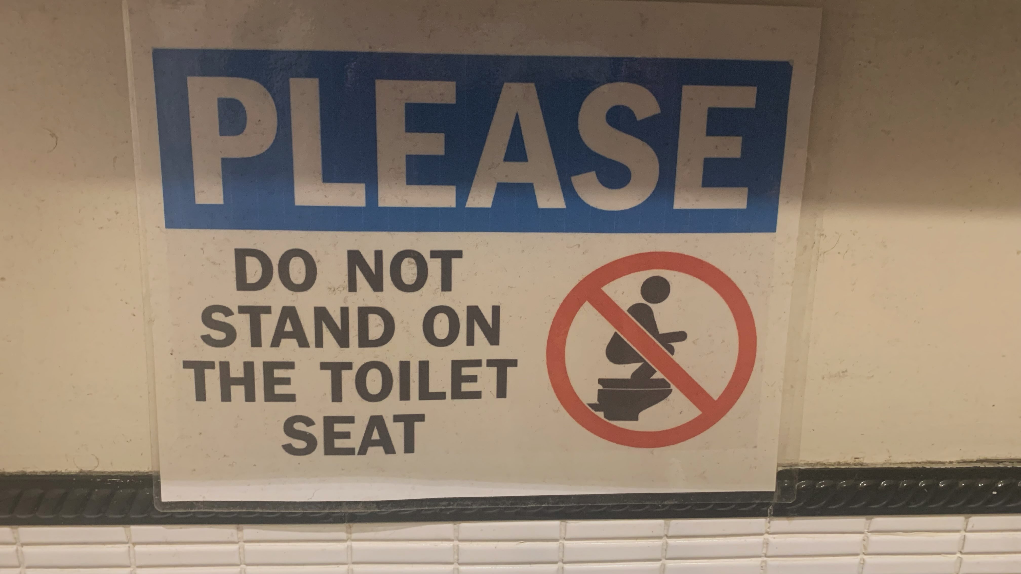 Unusual Restroom Sign at Asian Supermarket in Peoria Arizona