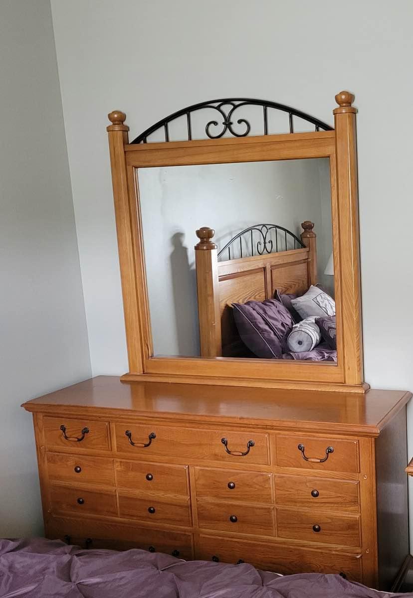 Queen bed frame ( no mattress) and matching dresser with mirror. Beds