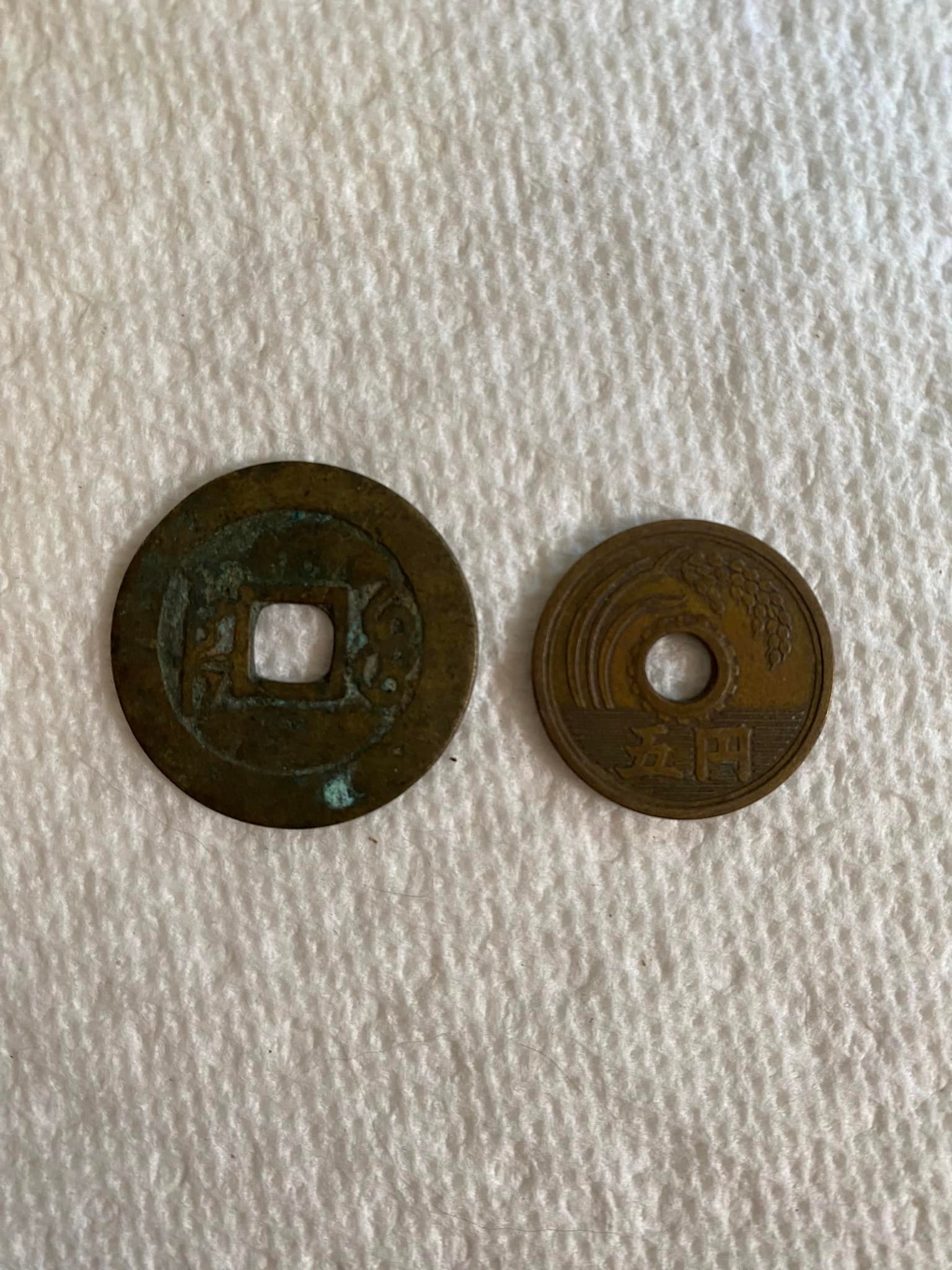 What are Chinese coins with round and square holes?