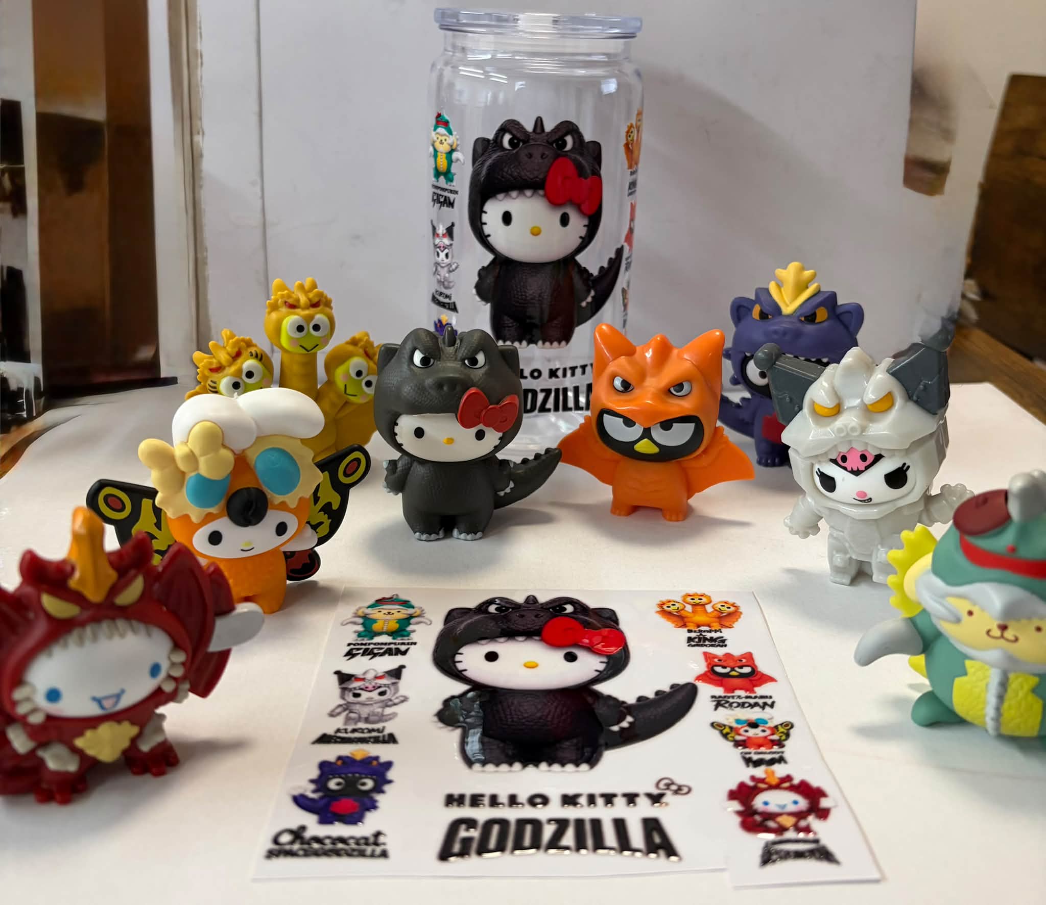 Sanrio x Godzilla 16oz plastic can cup with Hello Kitty and friends