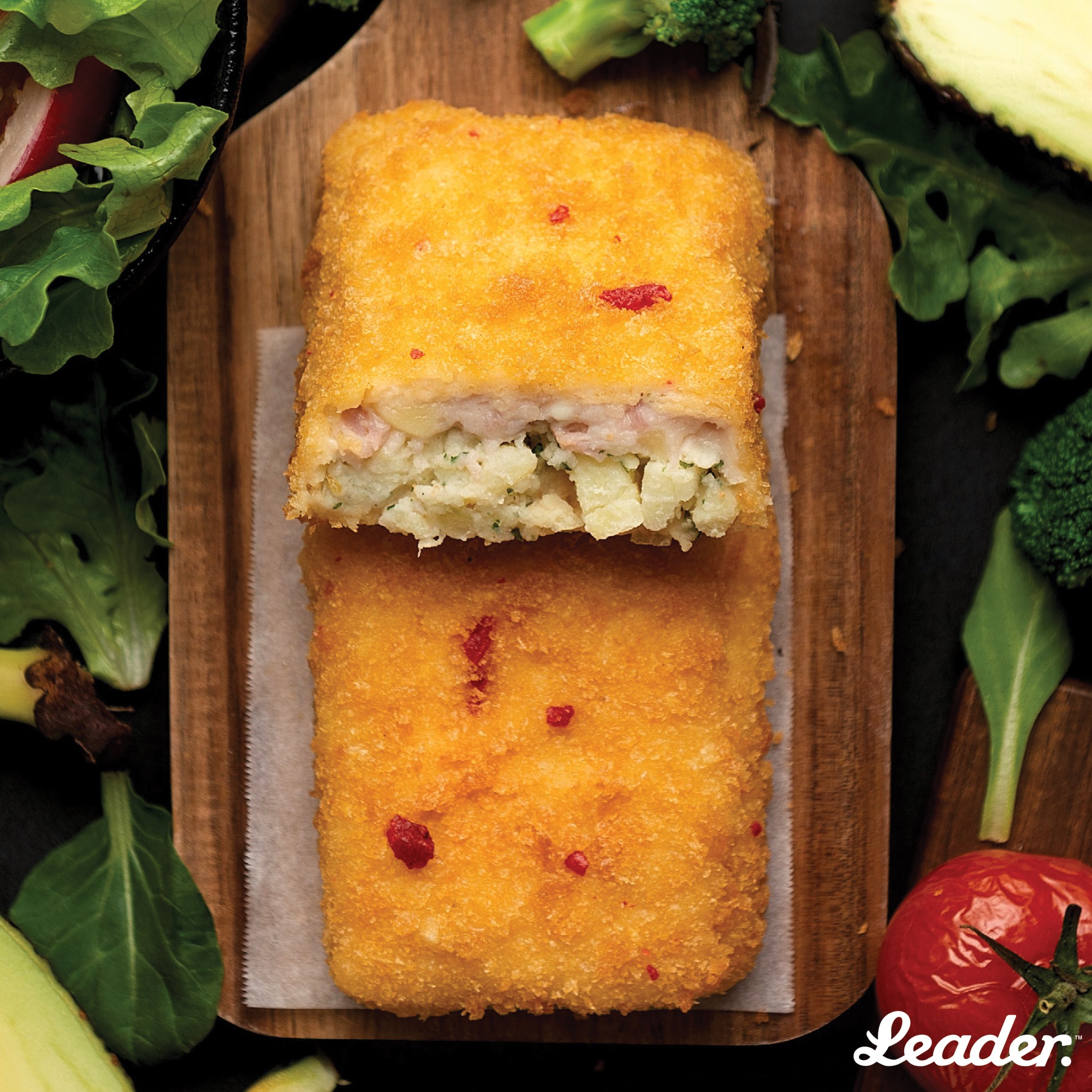Leader - We present the Bacon & Cheese Toppa! A potato hash brown base ...