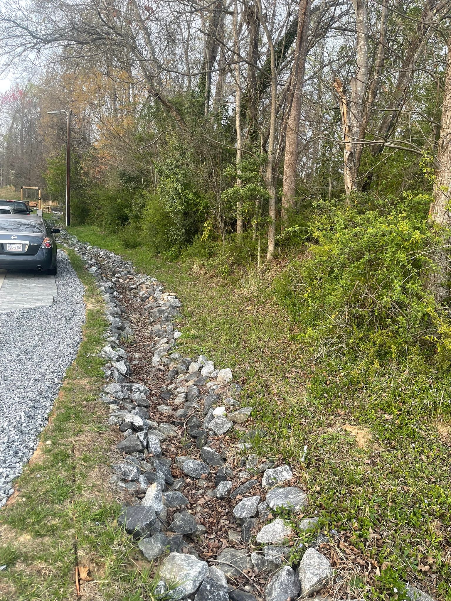 Will water destroy stone patio near ditch?