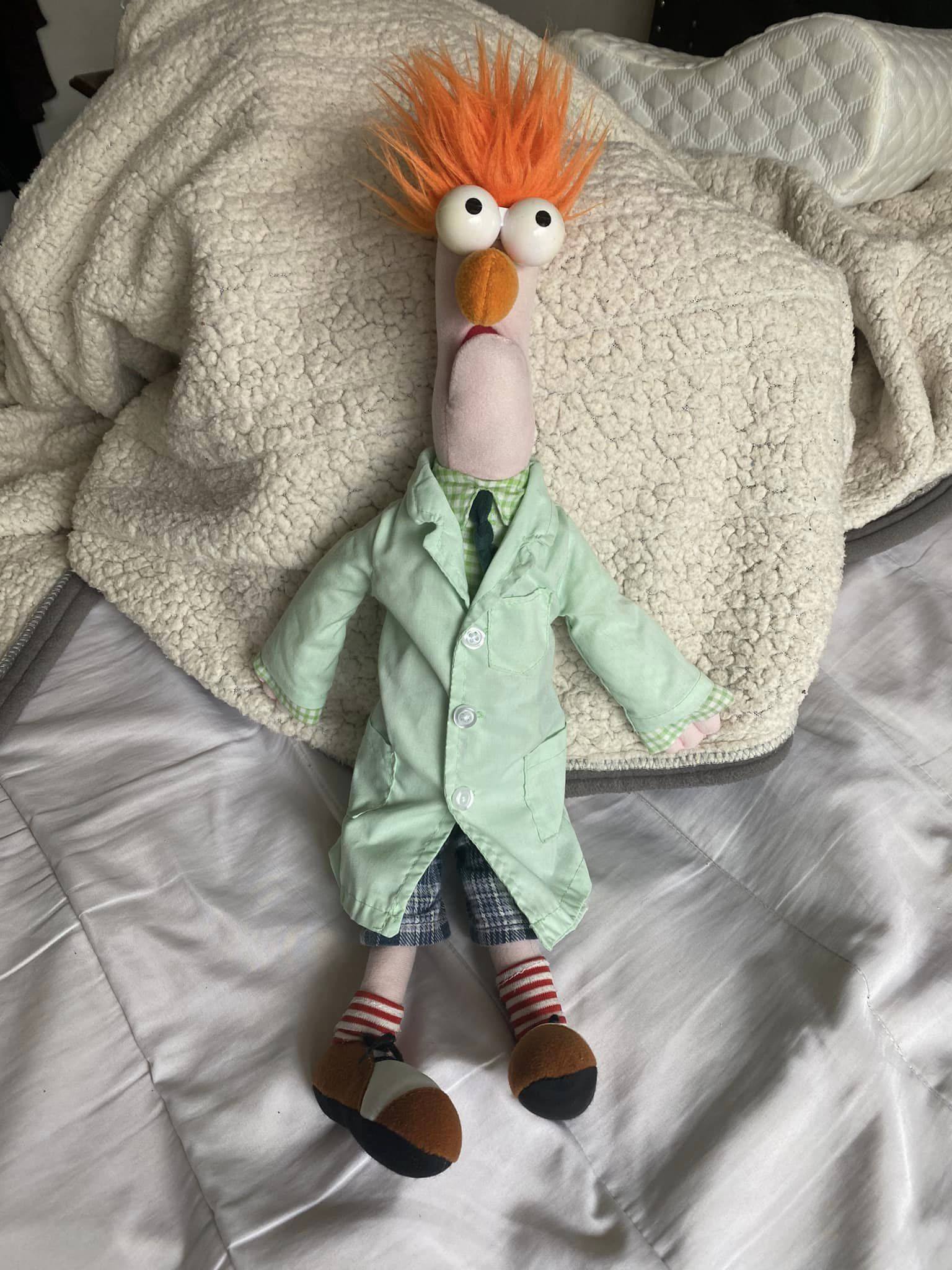 Erik showing off his new full scale Beaker from the Muppets plush!