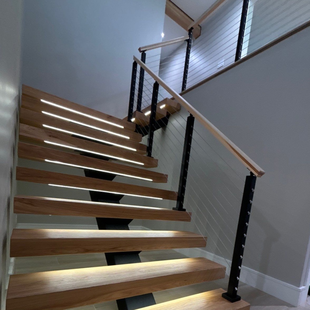 This stunning floating staircase... - Alpha Railing Company