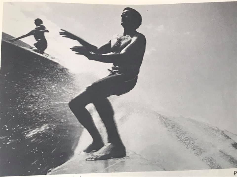 Dr. Don James captures surfer at Makaha with big point surf
