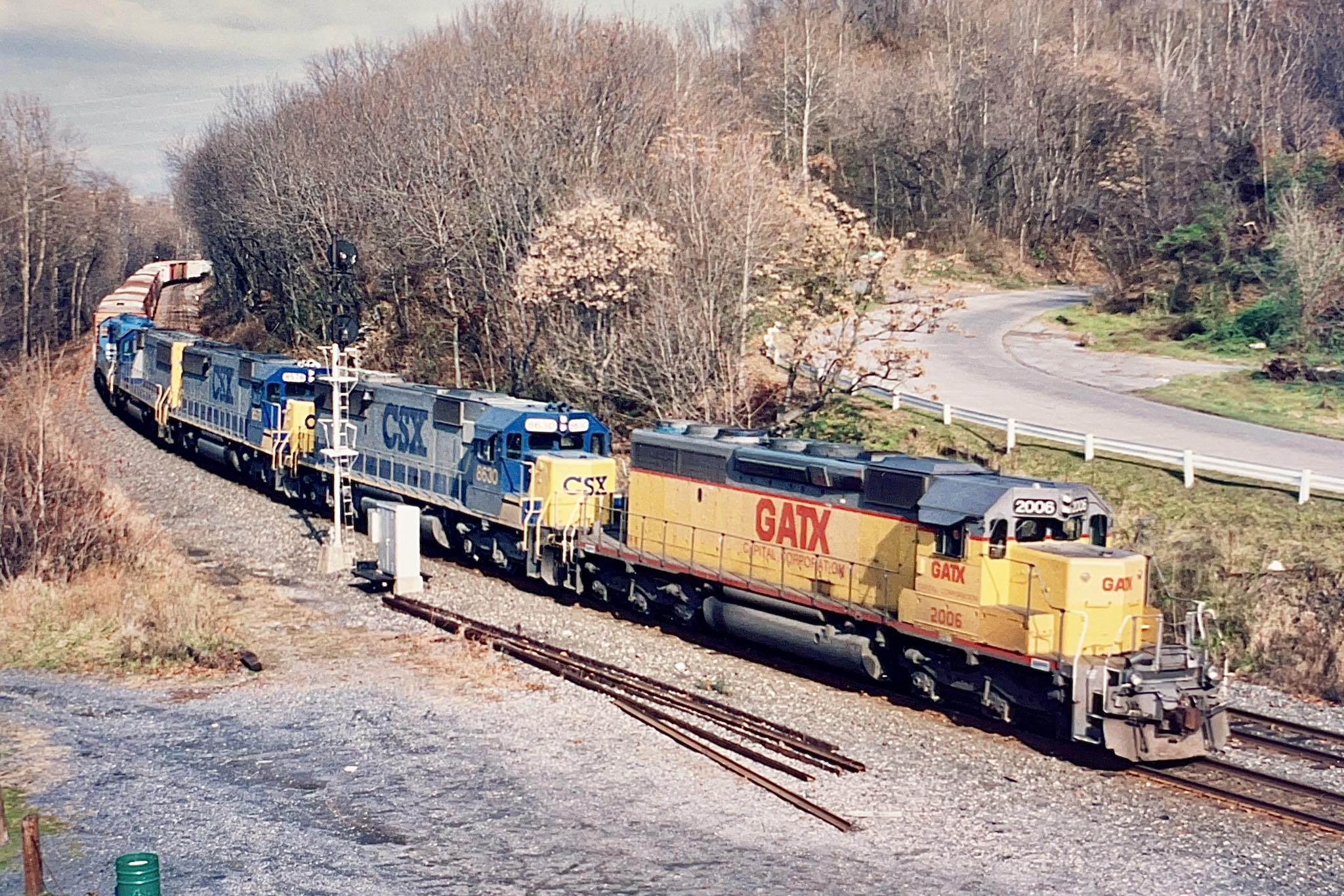 GATX 2006 leads 556 east at CP Ham in Dec. '92
