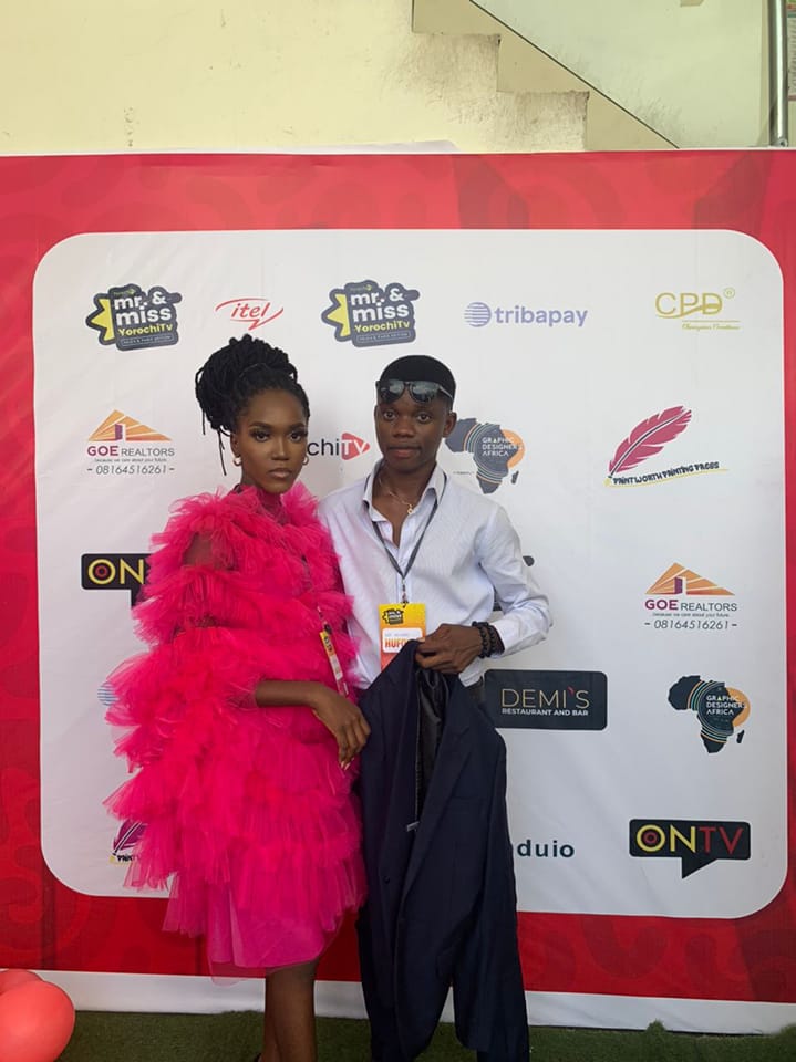 Esther Abiola rocks a pink dress with confidence