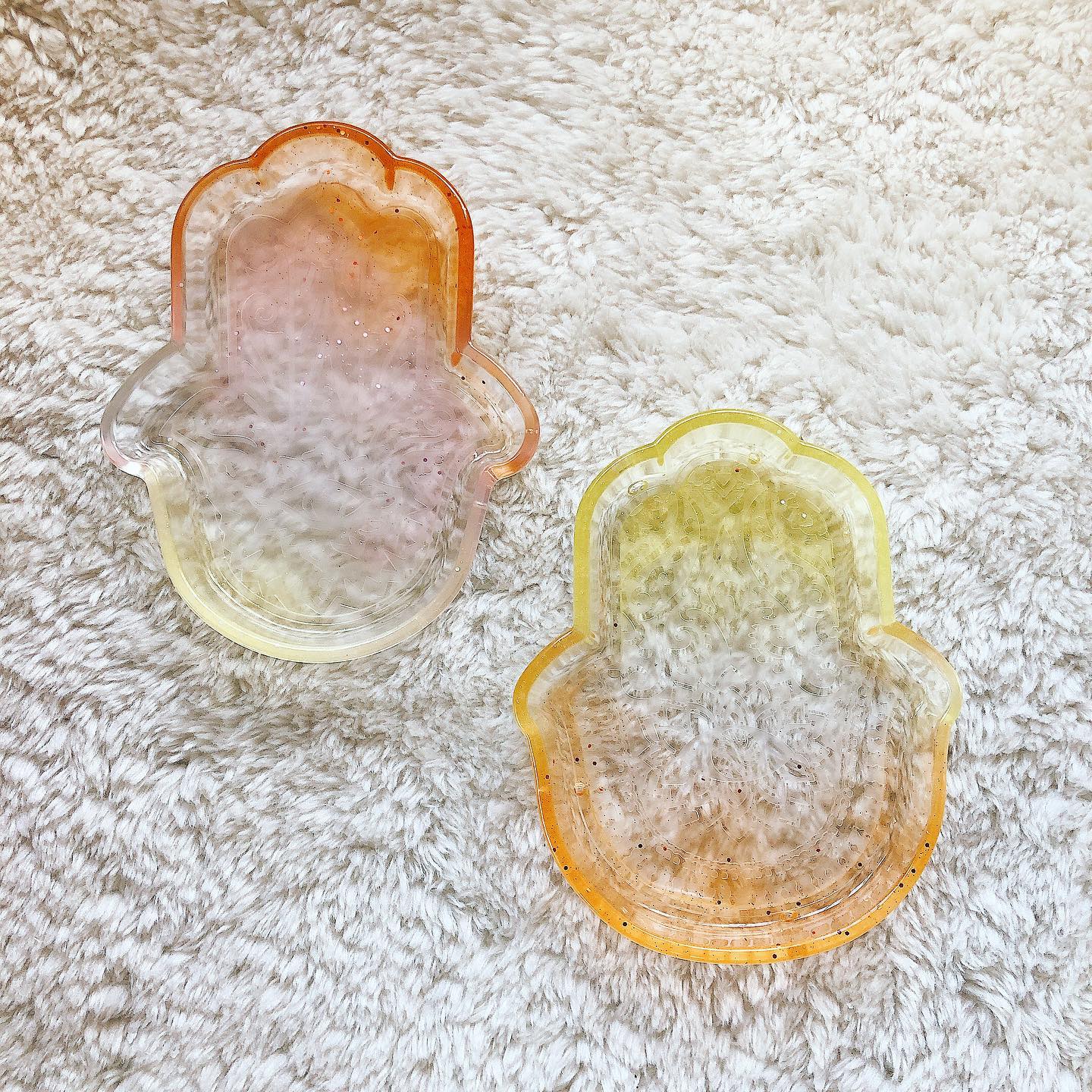 Simple Strands - Our new hamsa resin pieces are up!...