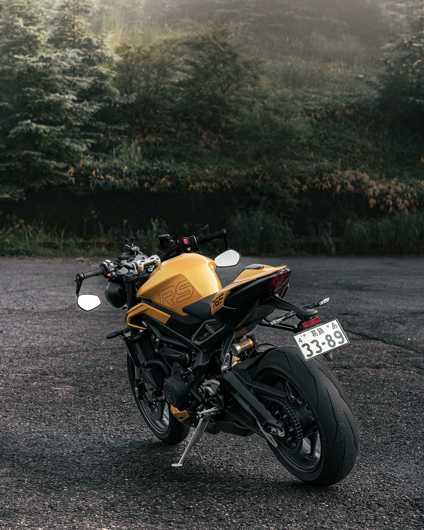 Make heads turn with the Street Triple 765 RS in Cosmic Yellow