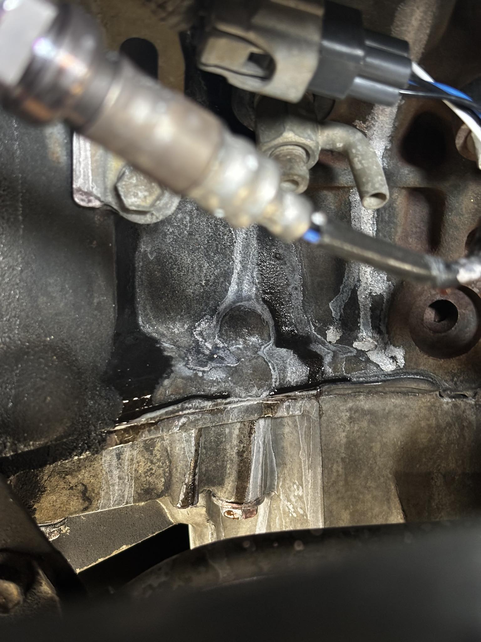 What is causing the coolant leak on the passenger side of my 2004
